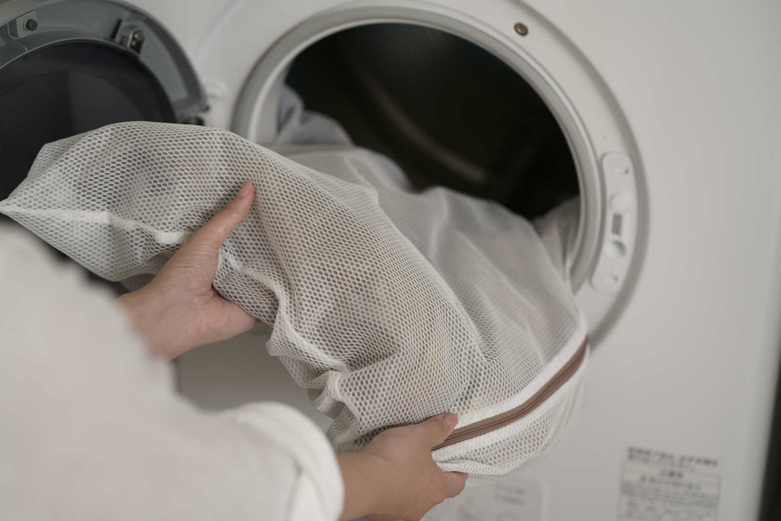 衣類の大きさに合わせた洗濯ネットを使用します
