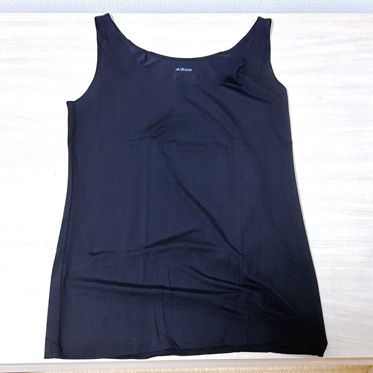  ユニクロ「エアリズムインナー」の‟コンパクトで型崩れしにくい”畳み方「マネする」「出張や旅行に便利」 