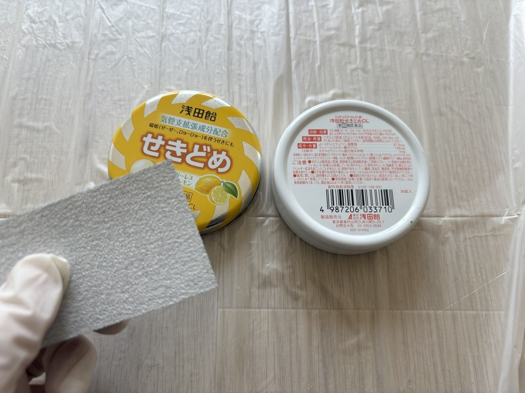 浅田飴の缶と紙やすり