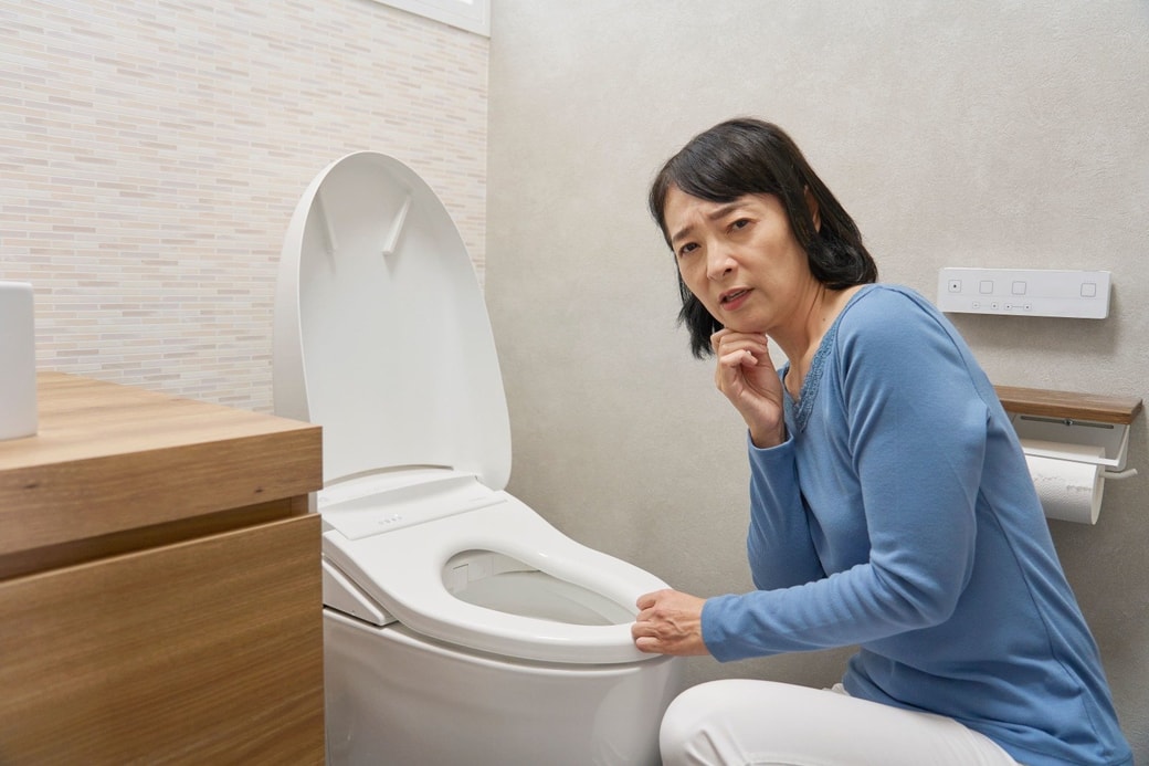トイレのトラブルに悩む女性