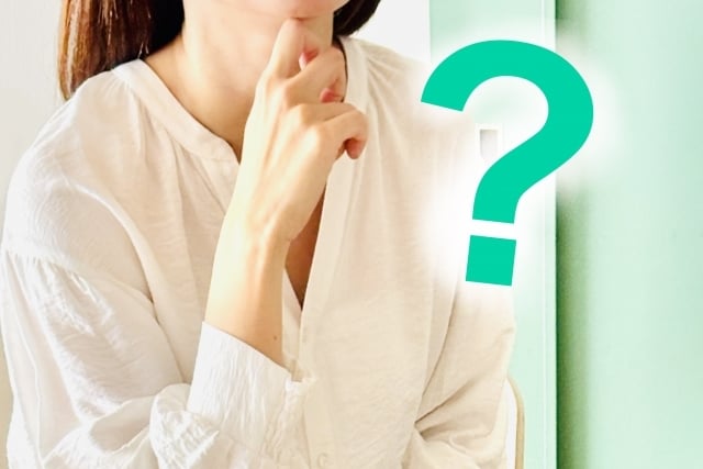 ？マークと女性