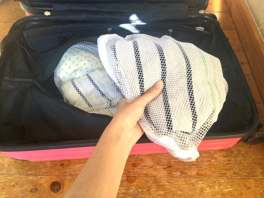 「衣服」をあらかじめ洗濯ネットに入れておく