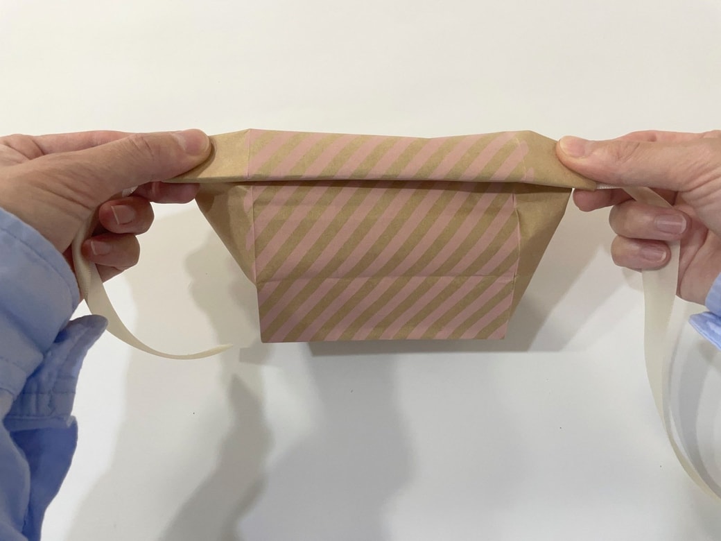 手前にくるくると巻いていく