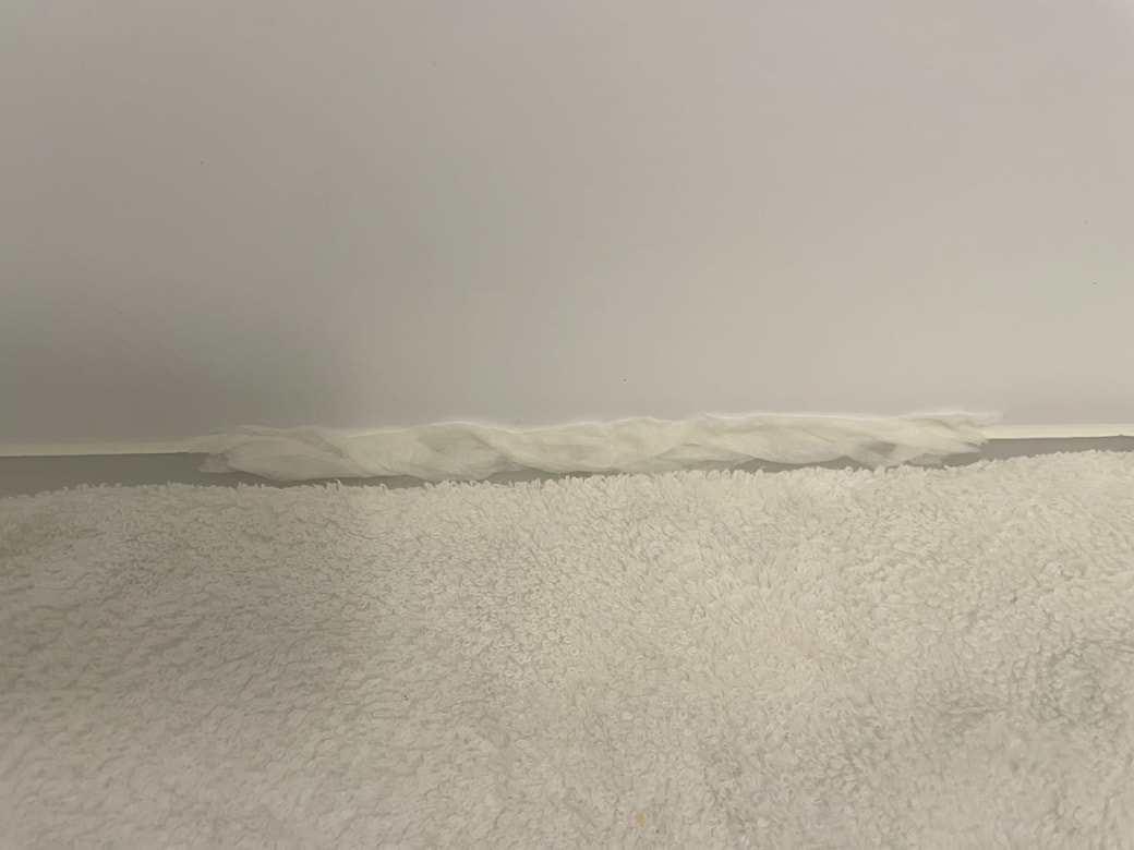 キッチンペーパーを貼りつける