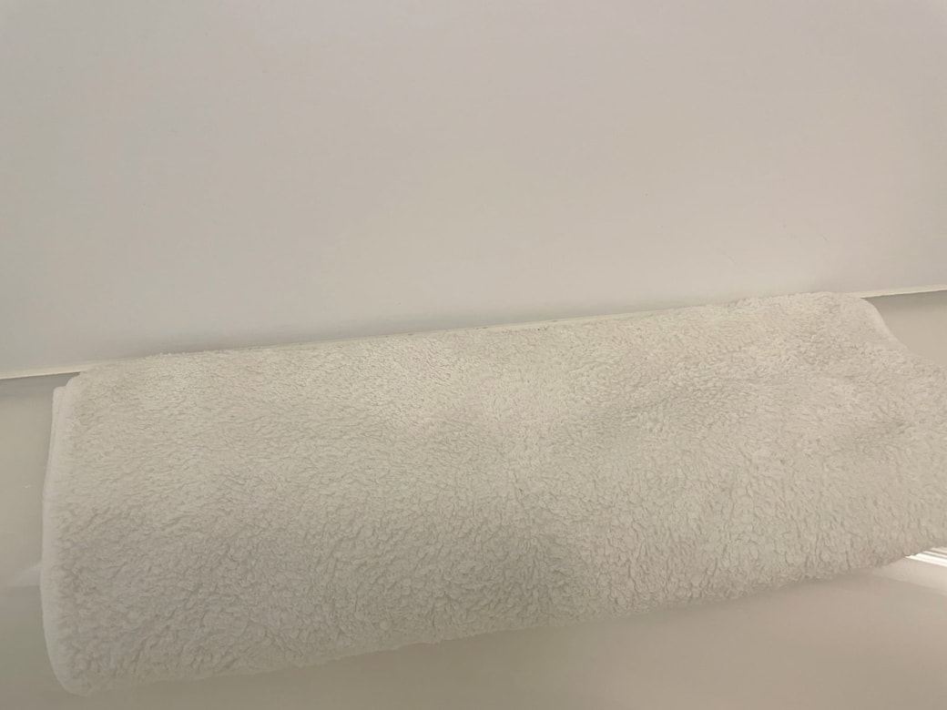 周囲を濡らしたタオルで保護する