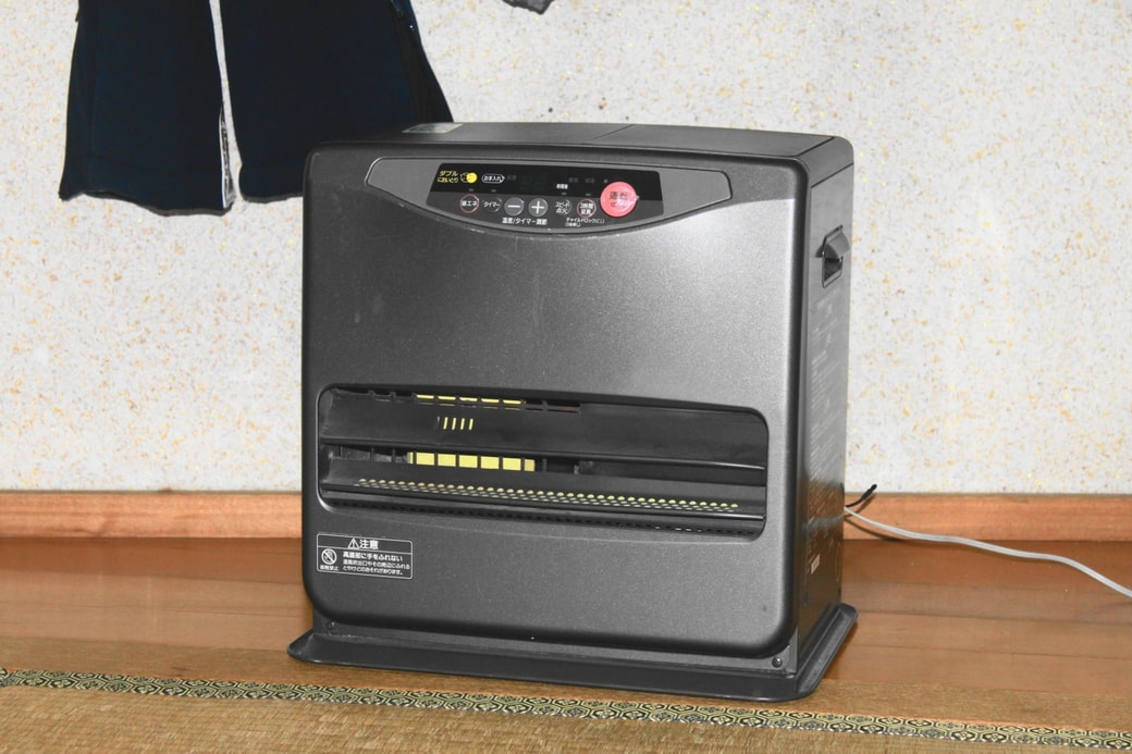 NG　ストーブの近くに干す