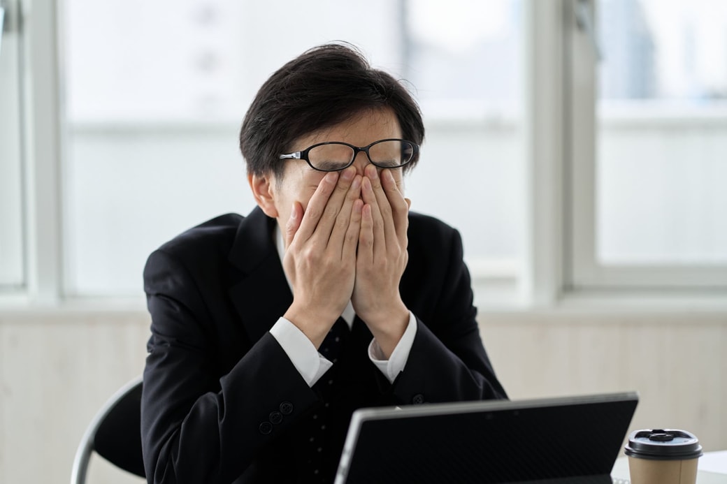 疲れている男性