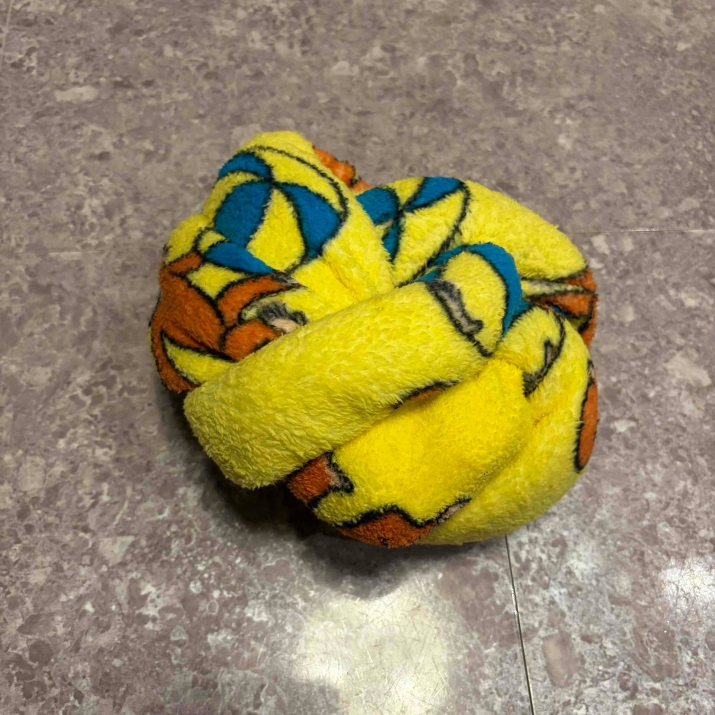 両端を結び目に入れ終わったところ