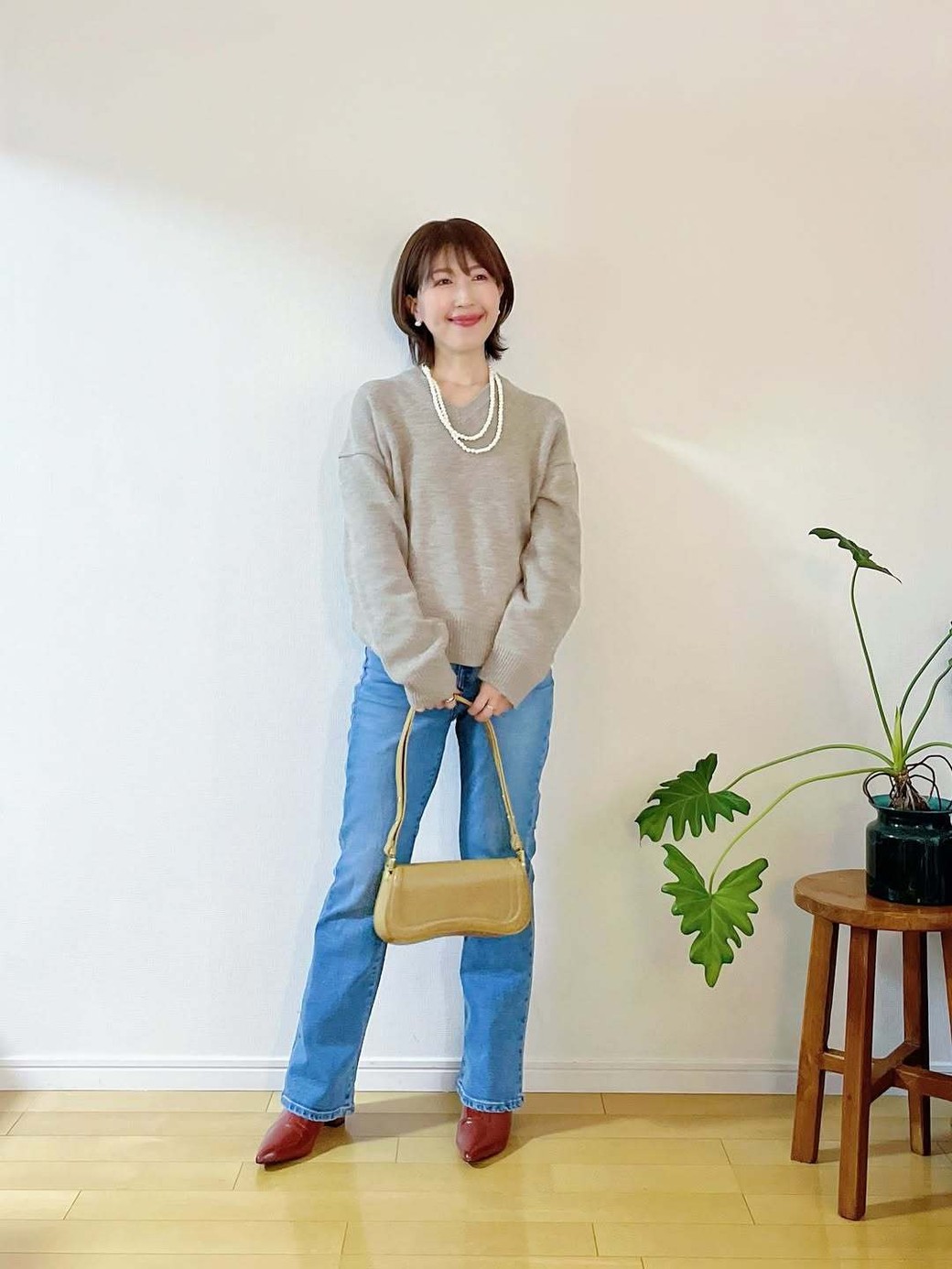 パールの2連ネックレスで顔まわりを華やかに。