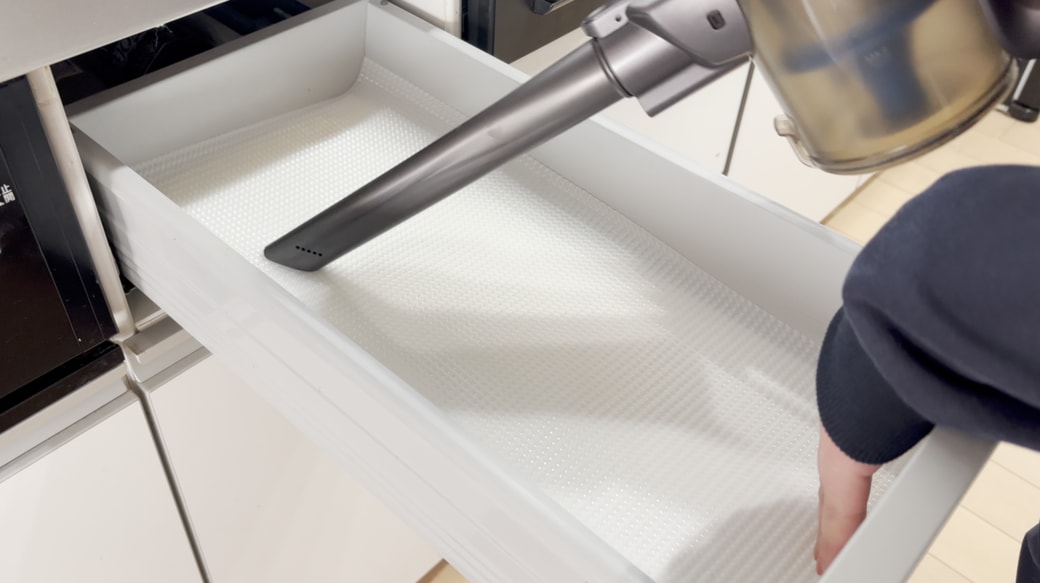 掃除機をかける