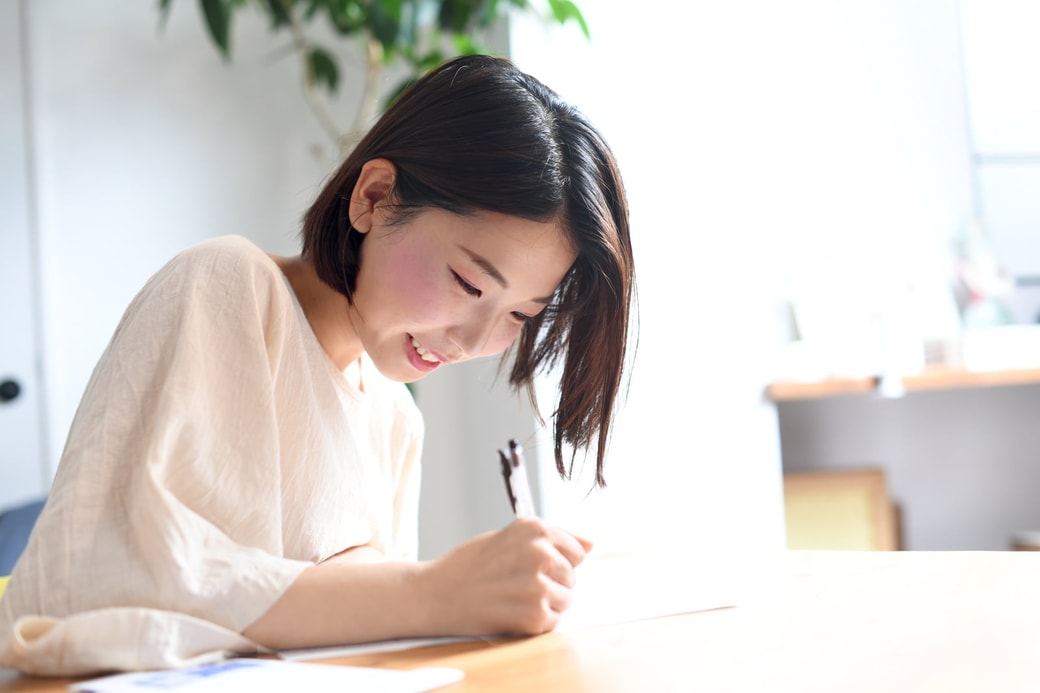 ノートに書く人