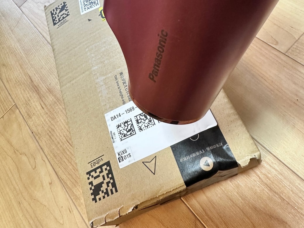 宛名シールをドライヤーで温める