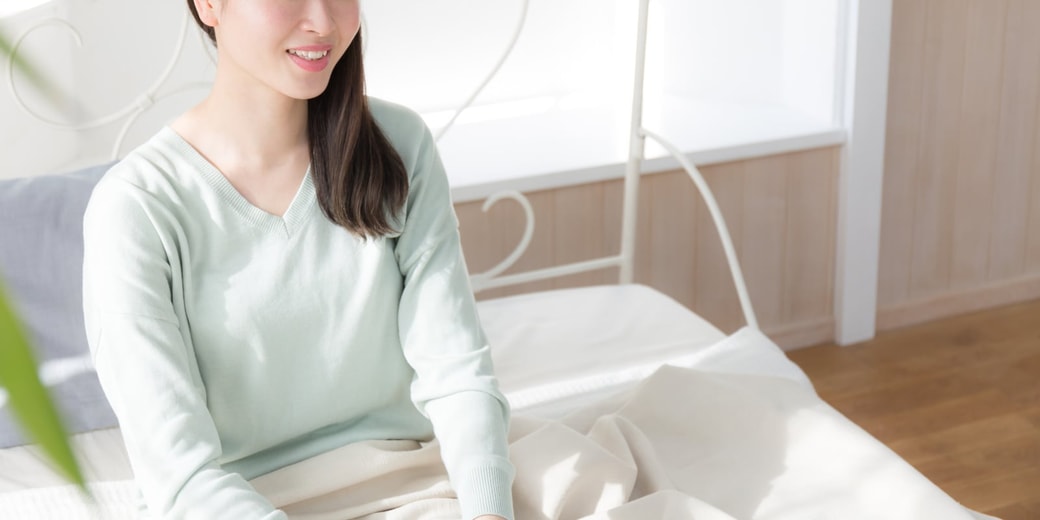 ベッドにいる女性