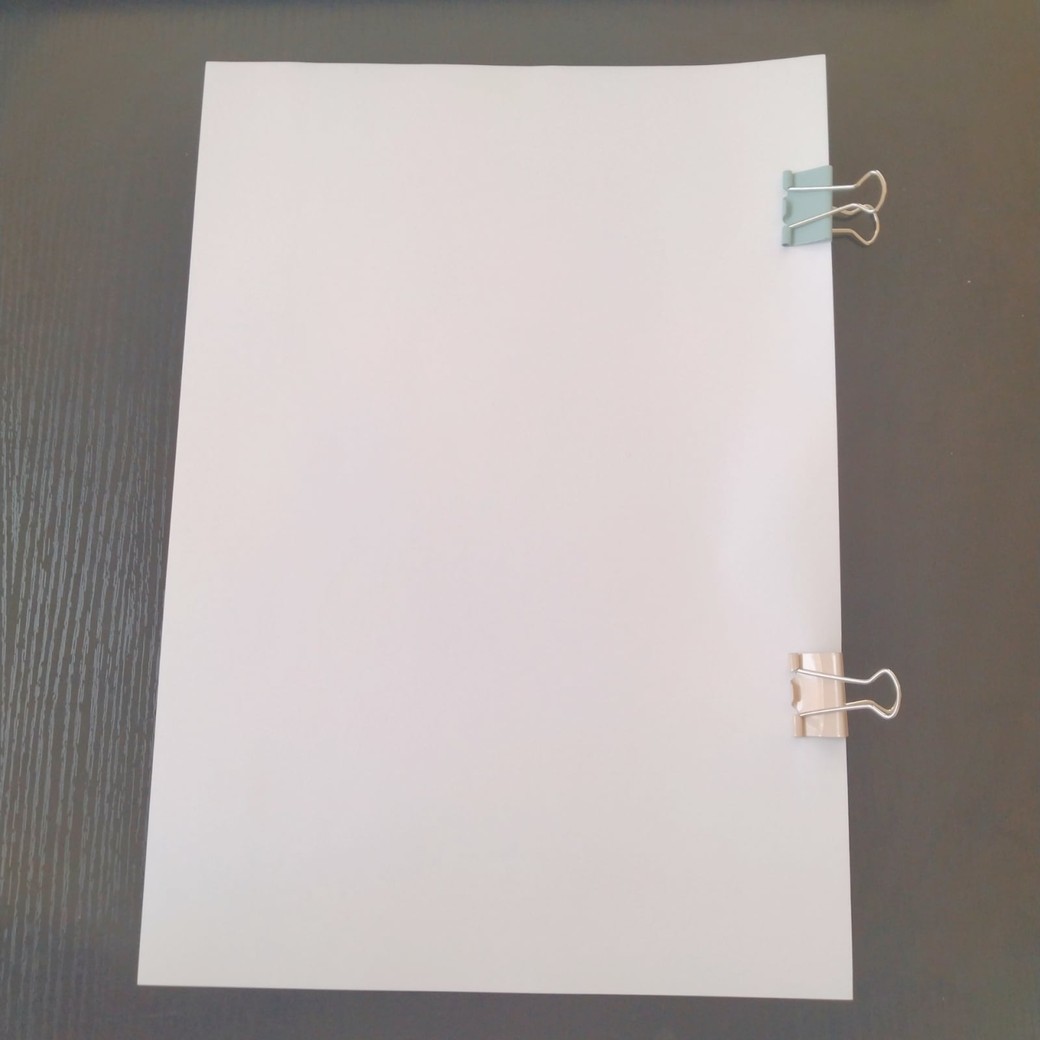 ダブルクリップで綴じた紙