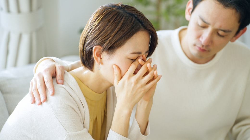 支える夫