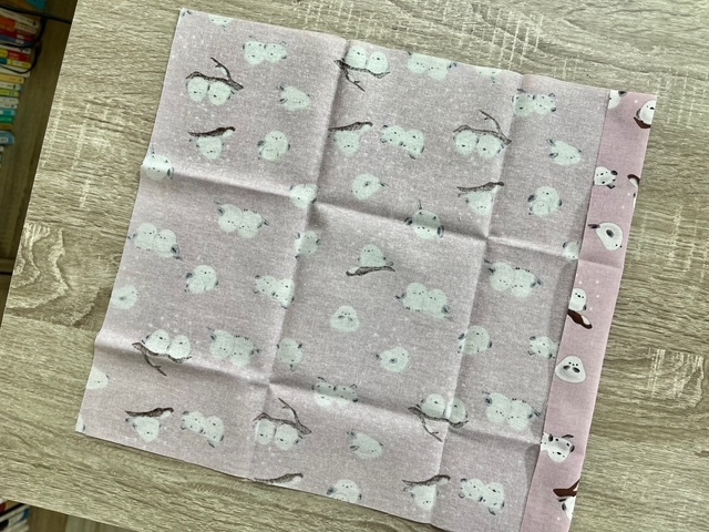 折る