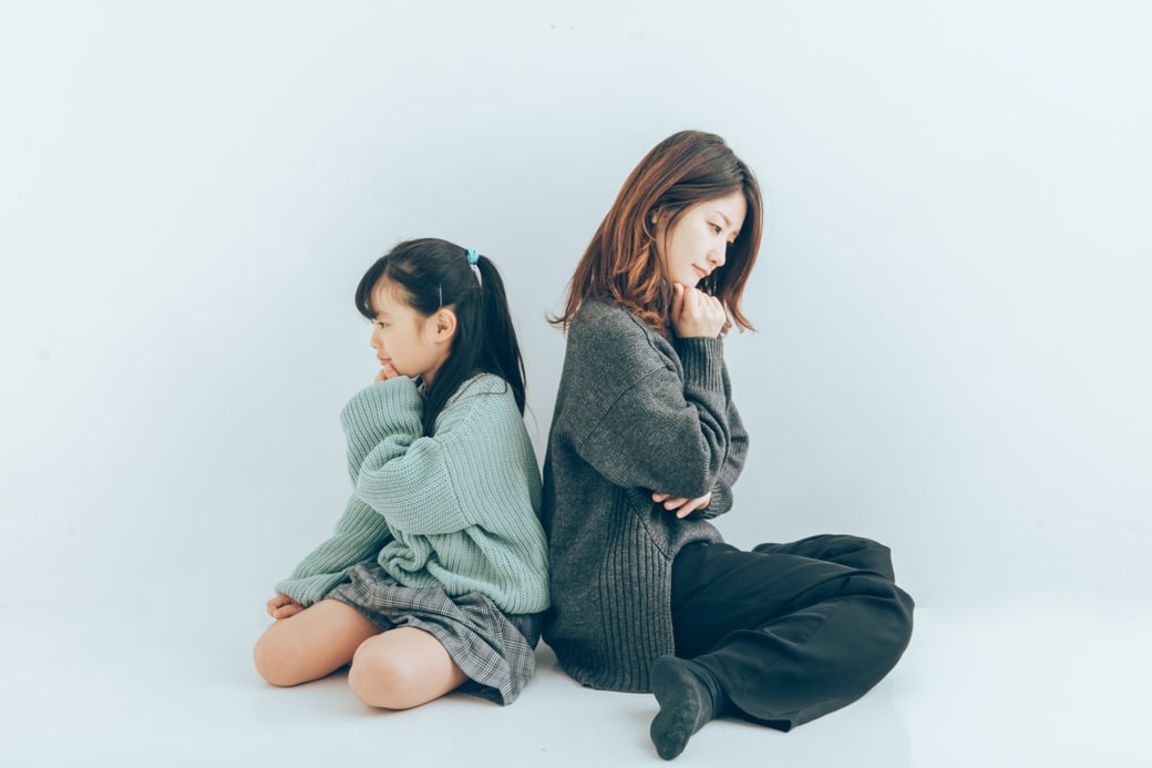 悩む親子