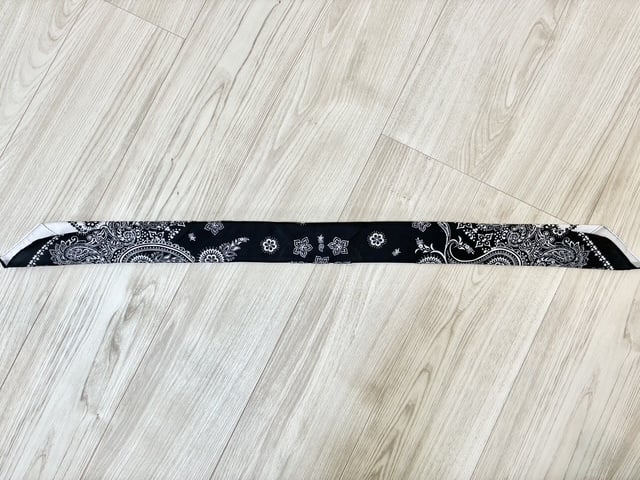 折る