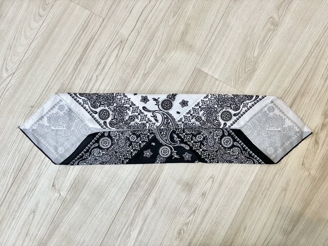 折る