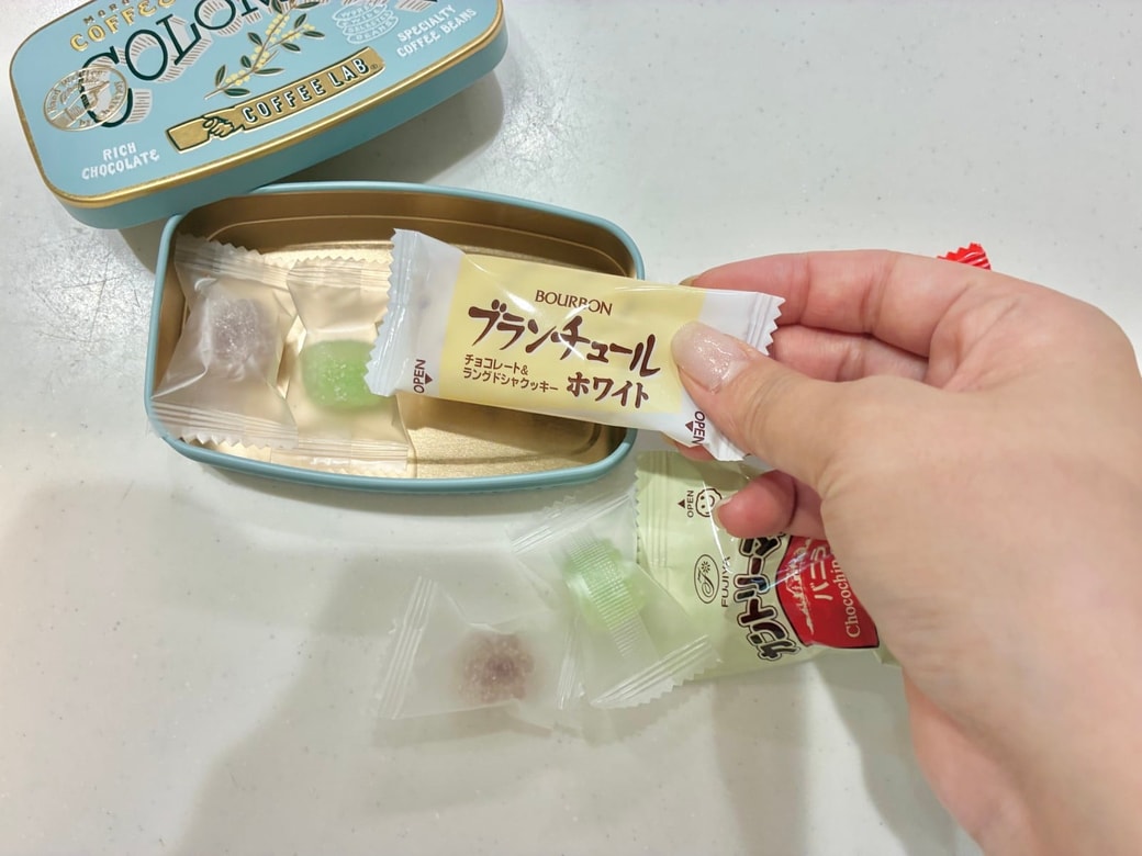 摘める