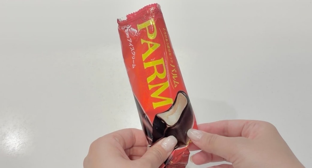 押す