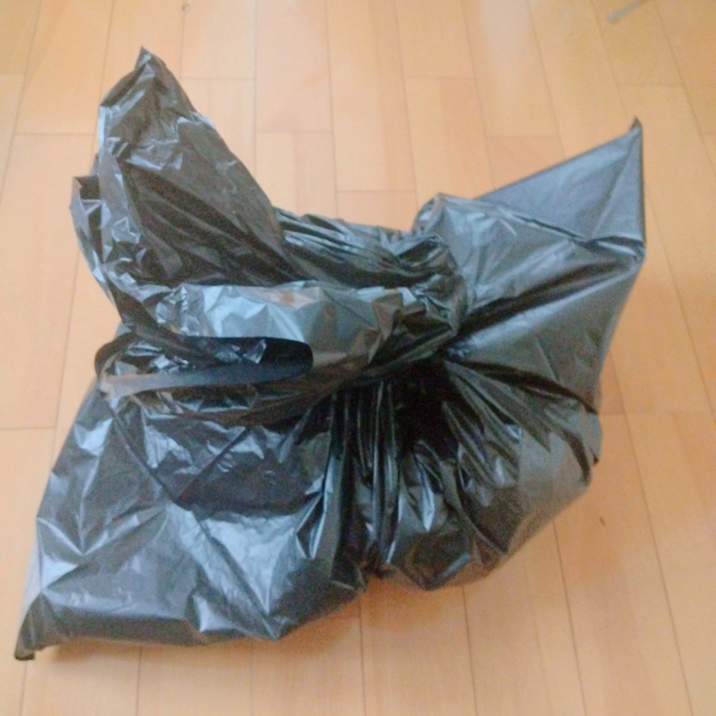 リュックサックを入れた袋