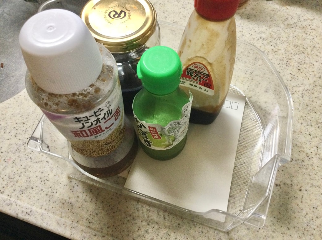ドアポケットにハガキを敷く