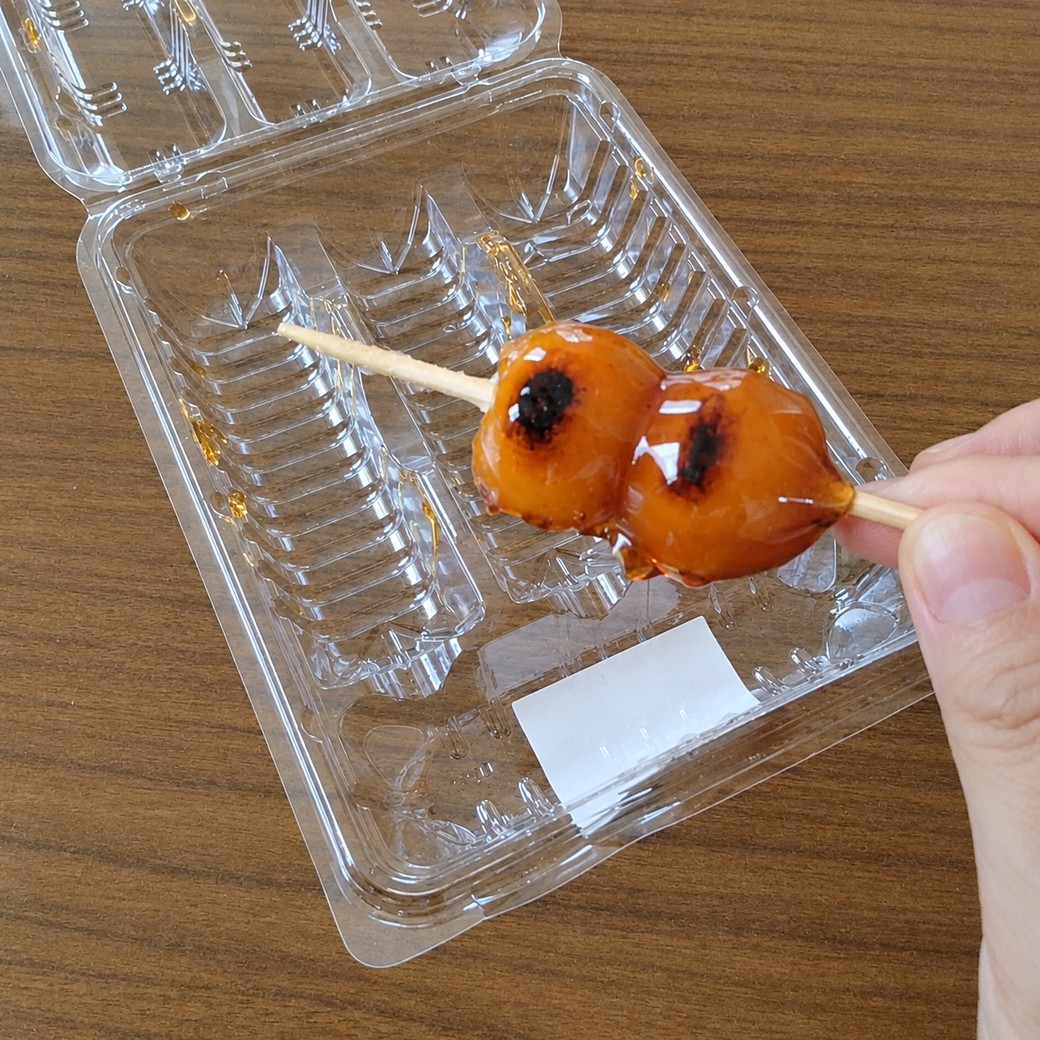 団子を持つ人
