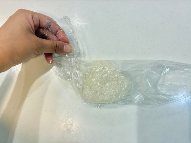 折る