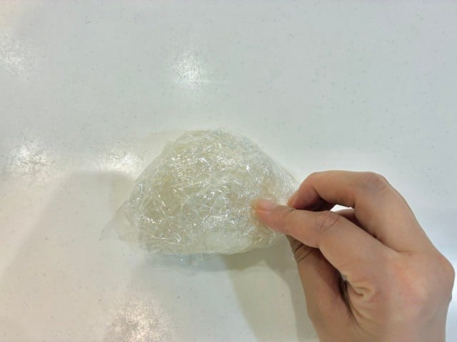 折る